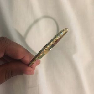 Gold colored bangle